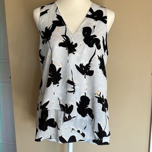 White top with black flowers